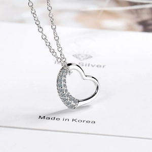 Silver heart pendant necklace with micro-pave crystals on a delicate cable chain
