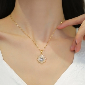 Luxury titanium steel snowflake necklace with sparkling zircon crystals on a female model
