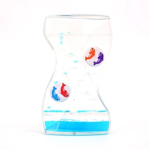 S-shaped liquid motion timer with blue oil and floating dolphins on white background