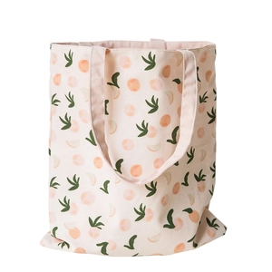 Double-sided canvas tote bag with pink fruit print and dual handles for daily shopping