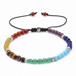 Detail of 4mm colorful chakra stone beads with adjustable woven cord and metal spacer