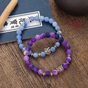 Set of purple and sky blue striped agate bracelets with antique silver owl charms