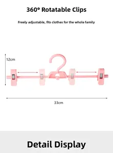 Pink rotatable pants hanger detail showing 33cm width and 4 adjustable sliding clips