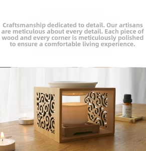 Close-up of bamboo wood essential oil burner with hollowed patterns and ceramic tray