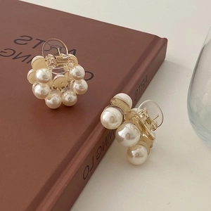Elegant mini pearl hair claws with transparent acrylic and gold metal springs