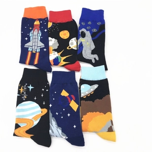 Cotton crew socks with space exploration patterns featuring rockets, planets and astronauts