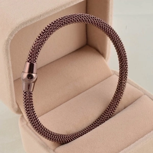 Rose gold braided mesh stainless steel cable bracelet with magnetic cylinder clasp