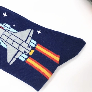 Deep blue crew socks featuring a galactic space shuttle pattern and high-quality cotton knit