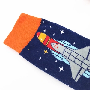 Navy blue cotton crew socks featuring orange cuffs and cartoon rocket galaxy pattern