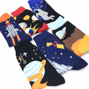 Detailed flat lay of six cotton crew socks with space, astronaut, and planet patterns