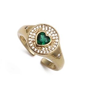 Detail of gold-plated adjustable ring featuring a heart-shaped green zircon stone