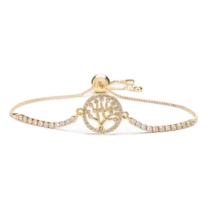 Adjustable gold tree of life bracelet with white cubic zirconia on white background