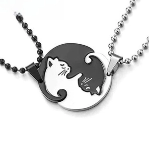 Detailed view of Yin Yang cat puzzle necklaces for couples in black and silver finish