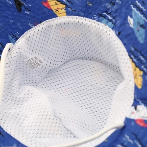 Kids shark print sun hat with breathable mesh lining and adjustable chin strap