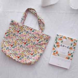 Floral cotton tote bag with vintage flower patterns and soft fabric handles for daily use