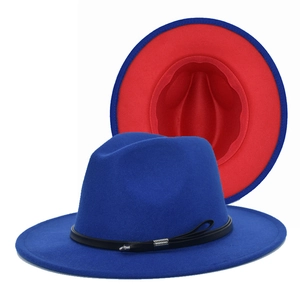 Detail view of royal blue fedora with red lining and black leather band decoration