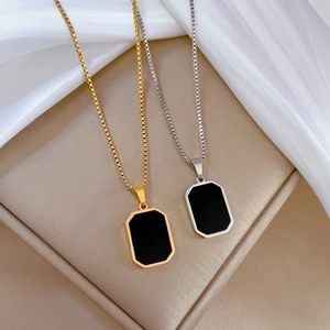 Minimalist geometric square pendant necklaces in gold and silver with black insets