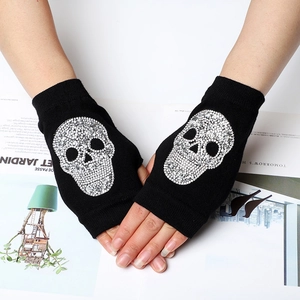 Black knitted fingerless gloves featuring a sparkling silver rhinestone skull design