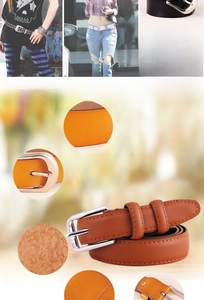 Detail view of genuine leather belt with orange brown cowhide and golden zinc alloy buckle
