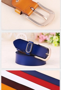 Detail of genuine leather women belt featuring silver metal pin buckle and smooth grain