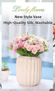 Close-up of pink artificial carnations in beige ceramic vase with high quality silk fabric