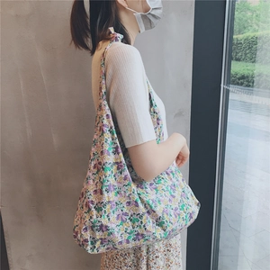 Floral print cotton tote bag shown on model for elegant daily casual outfit