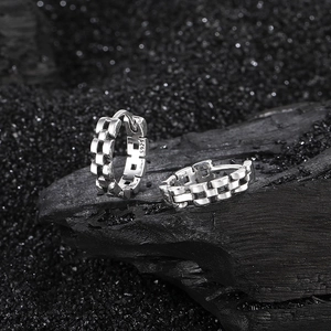 S925 sterling silver hoop earrings with chain texture on dark carbon background