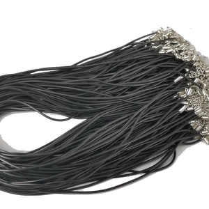 Detail of 1.5mm black waxed cotton cord bundle with silver lobster clasp and extension chain