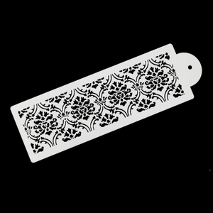 Damascus style floral stencil for cake decoration with a white cutout pattern