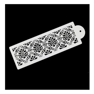 White cake stencil with floral relief patterns for embossing and spray decorating