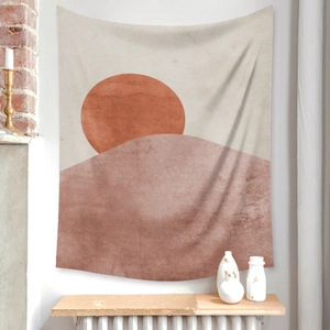 Detailed texture of bohemian tapestry featuring abstract sun and mountain landscape