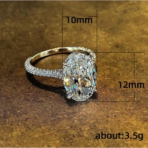 Elegant silver ring featuring a large 10x12mm oval zircon and micro-pave side stones