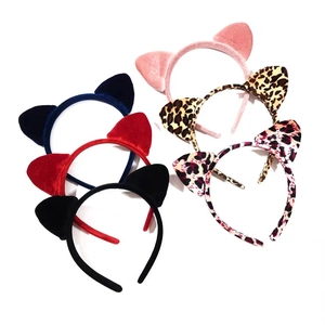 Various colors of velvet cat ear headbands including leopard print and solid shades