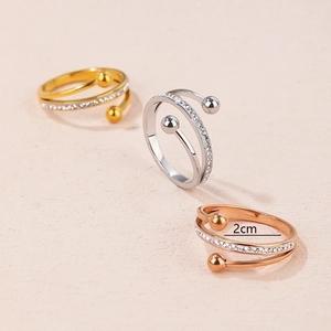 Three minimalist titanium steel open rings in gold, silver and rose gold with pavé crystals