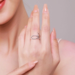 S925 sterling silver open ring with hollow sparkling pavé leaf design on model's finger
