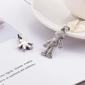 Minimalist titanium steel pendants featuring cute astronaut and cartoon girl designs
