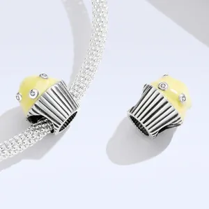 S925 sterling silver cupcake charm with yellow enamel and sparkling zircon stones