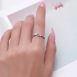 Elegant S925 sterling silver open ring with sparkling cubic zirconia on a model hand