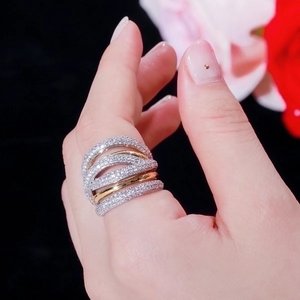 Fashionable multi-layer mixed metal ring featuring micro-pave crystals on wide bands