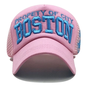 Detail of pink mesh baseball cap with blue 3D embroidery of Property of City Boston