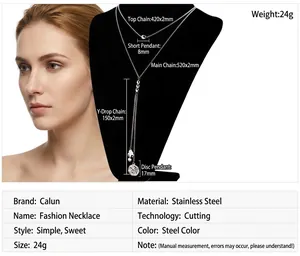 Detail of double-layer stainless steel necklace with heart pendant on model