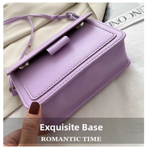 Detailed close-up of lavender purple rectangle crossbody bag with elegant stitching detail
