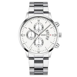 Macro view of white business chronograph watch with three sub-dials and date window