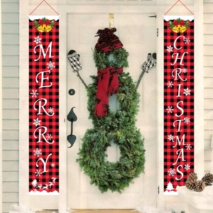 Classic red and black plaid Merry Christmas door banners displayed on an entrance