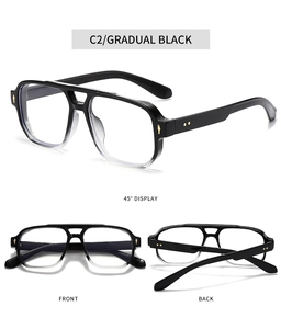 Detailed view of dual-bridge aviator frames with gradual black finish and gold rivets