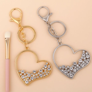 Sparkling rhinestone heart keychains in gold and silver finish with lobster clasp hooks