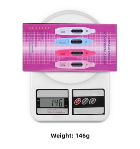 Portable electric nail drill weighing 146g on a digital scale for accuracy