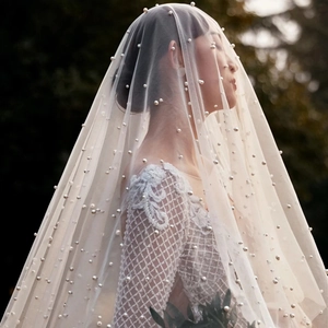 French vintage bridal wedding veil with elegant pearls and sheer soft white tulle material
