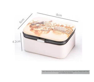 Detail view of portable pink leather jewelry box with dimensions 8x6x4.2 cm