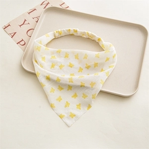 White chiffon headband with yellow butterfly pattern and elastic band detail